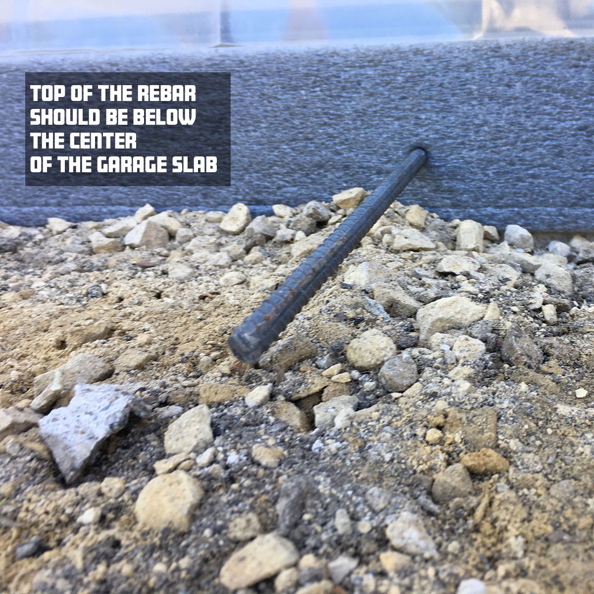 A piece of rebar extends from a concrete slab, resting on gravel. Text advises that the rebar's top should be positioned below the garage slab center.