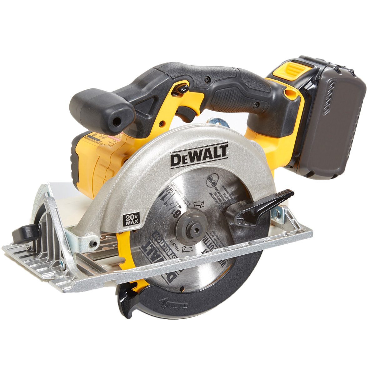 A circular saw with a yellow and black handle cuts through materials, featuring a sharp metal blade mounted on a metallic base.