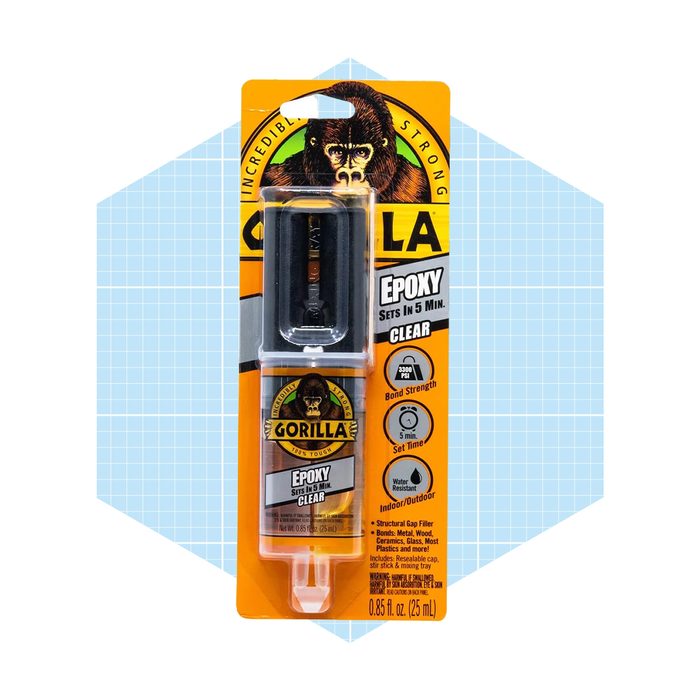 A tube of clear epoxy adhesive is packaged prominently, labeled 