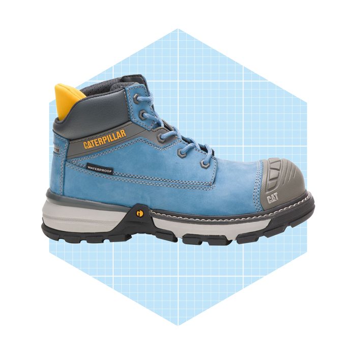 A blue waterproof work boot stands on a light blue grid background, showcasing reinforced toe and logo details.