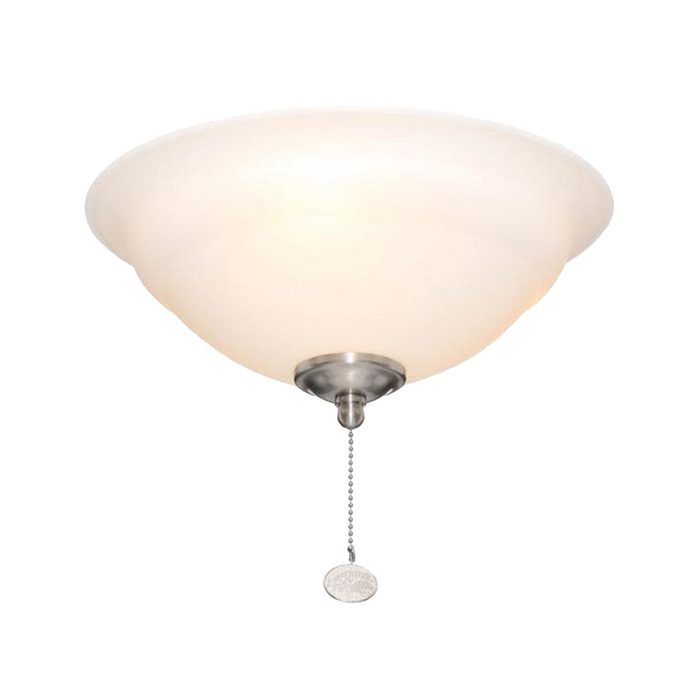 A ceiling light fixture casts soft illumination, suspended by a metal mount. It features a smooth, rounded glass shade with a pull chain for operation.