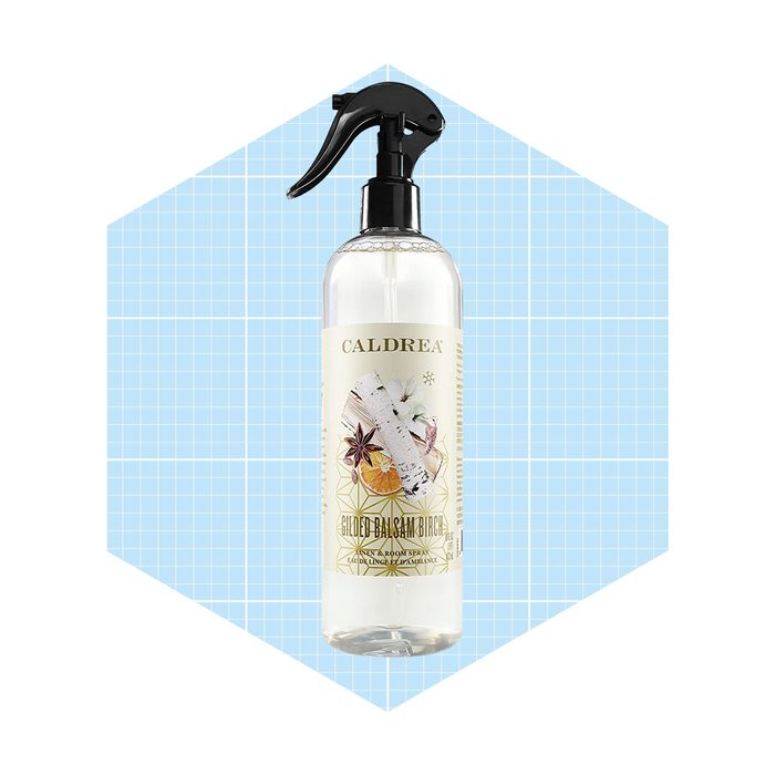 A clear spray bottle labeled 