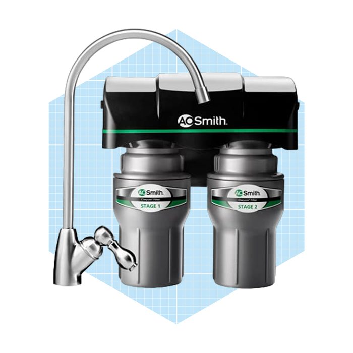 A water filtration system with two grey filters labeled 